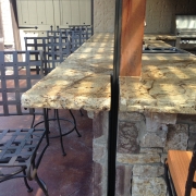 Modification with granite countertop.  Slot created so slide bar passes thru to the ground.