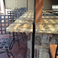 Modification with granite countertop.  Slot created so slide bar passes thru to the ground.